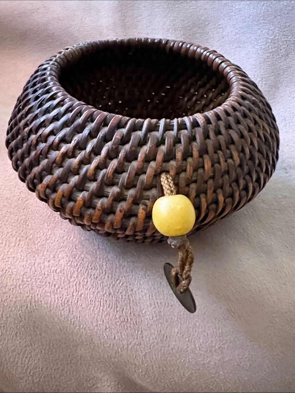 Vintage Handwoven Dark Brown Woven Decorative Basket with Yellow Accent Bead